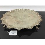 A George II silver salver, Richard Rugg, London 1759, scrolling shell border, diameter 36.