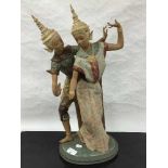 A Lladro bisque figure of two Thai girls dancing in traditional dress, height 53cm.