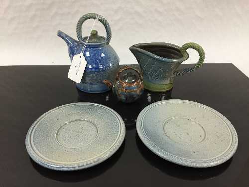 Jane Hamlyn (born 1940): A salt glazed small teapot, in blue glaze, spiral decoration,