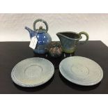 Jane Hamlyn (born 1940): A salt glazed small teapot, in blue glaze, spiral decoration,