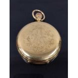 An 18ct gold full hunter Karrusel pocket watch by S Smith and Son, 9 Strand London,