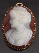 A cameo brooch mounted in yellow gold, 3 cm x 2.3 cm.