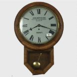 A nineteenth century oak cased wall timepiece, the dial signed John Smith & Sons,