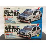 Two Corgi Austin Metro Motorsport radio controlled model cars, numbered M5900, both parts boxed.