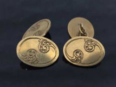 A pair of 9ct gold oval cufflinks, 9.9g.
