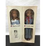 A collection of Sasha dolls and related items including 508 Baby Brunette White Bird,