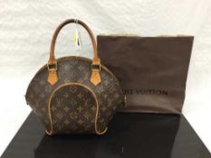 Louis Vuitton : A lady's Ellipse hand bag, monogram canvas with tan trim, zip top,