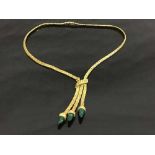 A yellow gold flat linked necklace with malachite drops, indistinctly marked, 30.9g.