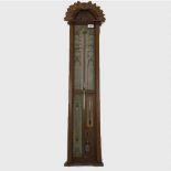 A nineteenth century carved oak Admiral Fitzroy mercury barometer.