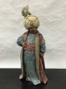 A Lladro bisque figure of a Persian gentleman, height 40cm.
