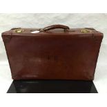 A mid twentieth century leather suitcase, by Antler, with canvas lined interior, initialled ER,