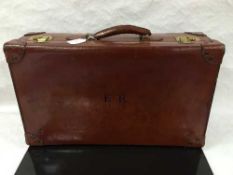 A mid twentieth century leather suitcase, by Antler, with canvas lined interior, initialled ER,