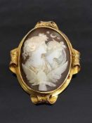 A fine late Victorian yellow gold cameo brooch depicting angels by a dove.