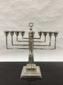 A sterling silver menorah, Rosenzweig, Taitelbaum & Co, London 1932,