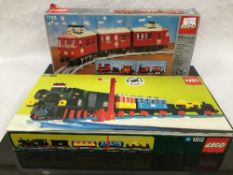 Four Lego sets, all relating to trains, numbers D182, 7725, 7725 and 7740, all parts boxed.