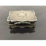 A Victorian silver vinaigrette, Birmingham 1861, with gilt and engraved interior, width 3.5cm, 21g.
