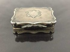 A Victorian silver vinaigrette, Birmingham 1861, with gilt and engraved interior, width 3.5cm, 21g.