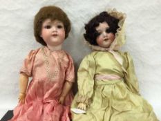 An Armand Marseille bisque headed doll numbered 390N,