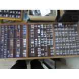 Printer's type tray containing a large quantity of assorted thimbles including examples in china