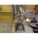 A patinated brass figure of Ganesha, on stepped base, height 42cm.