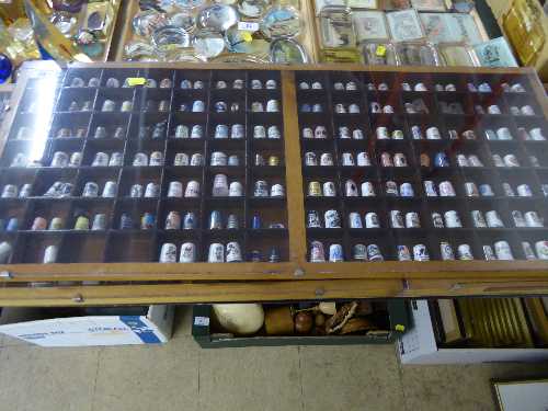 Printer's type tray containing a large quantity of assorted thimbles including examples in pewter