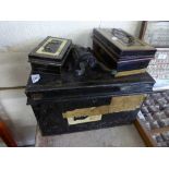 Metal deed box containing a quantity of metal cash boxes with keys,