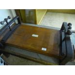 A mahogany and cast iron Empire Presser and Stretcher