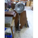 Mid twentieth century metal adjustable industrial style lamp together with four wooden rules