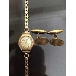 A lady's Record 9ct gold wrist watch and a pair of 9ct gold cuff links