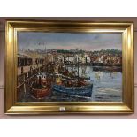 Gerald Hodgson : Fishing boats in a harbour with buildings beyond, oil on canvas, signed, framed.