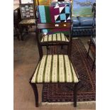 A pair of inlaid mahogany dining chairs