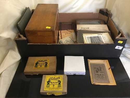 Box of case of glass slides, cigarette card album,