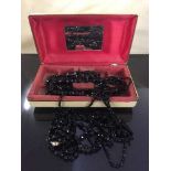 A collection of antique and later Whitby jet jewellery comprising of seven necklaces,