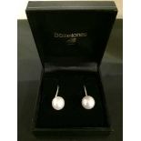 A pair of sterling silver fresh water pearl earrings in box