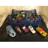 Box of die-cast vehicles including Dinky spectrum pursuit vehicle, car transporter,