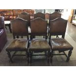 A set of six carved oak leather upholstered chairs