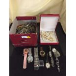 A box of costume jewellery and lady's watches