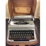 A cased Diana Royal manual typewriter