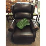 A brown leather electric reclining chair