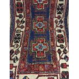 A box of six assorted woolen prayer mats and hearth rugs