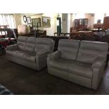 A grey leather G-plan two seater and three seater settees