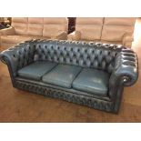 A blue button leather Chesterfield settee