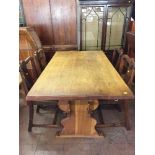 An oak refectory dining table