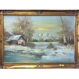 A gilt framed oil on canvas -= winter landscape signed Barack