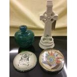 A Belleek china celtic cross figure, together with two paperweights and Mdina glass bottle.