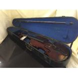 A violin and bow in wooden coffin case bearing paper label Norman Hunter, The Studio, Port Glasgow,