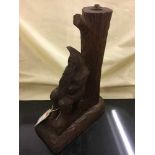 A carved Gnomeman table lamp base