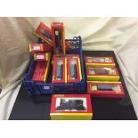 A box of fourteen boxed Hornby OO gauge engines and rolling stock