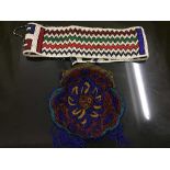 Vintage beaded purse together with a belt of the same era.