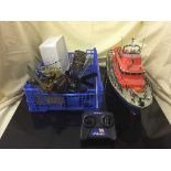 A basket of remote control RNLI life boat with hand set, die cast fire engine,